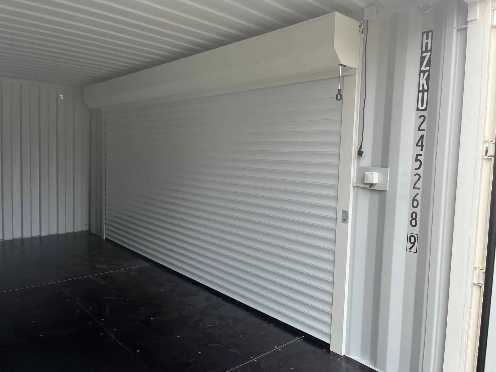 20' modified container with side roller shutter, RAL 9010 white